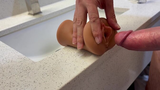 Hot wife pees on her hubby's thick cock in a hotel bathroom