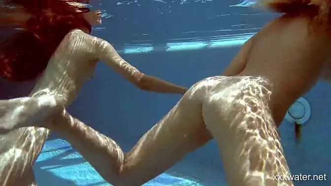 In the indoor pool &mdash;  two stunning girls swim