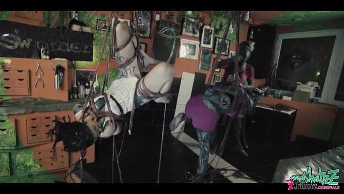 Inked goth babe gets tied up in shibari bondage with cute tattoo girl