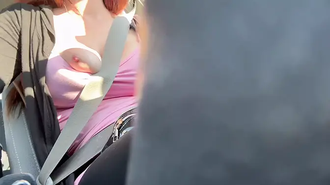 Italian MILF flashes huge tits and hard nipples while driving