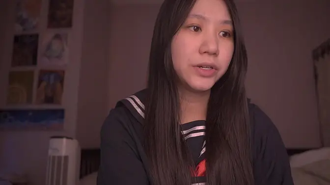 Japanese schoolgirl reads aloud in cosplay