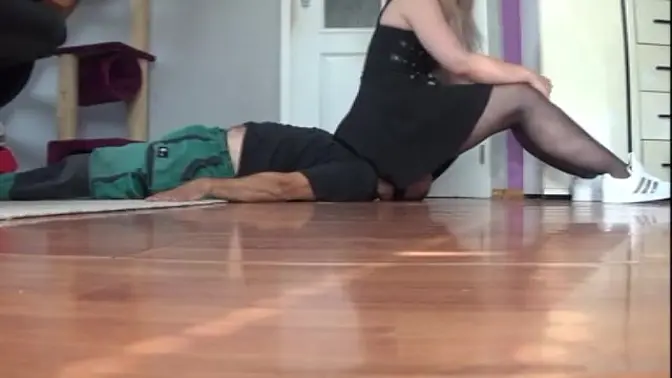 Kinky brunette tramples and sits on man's face