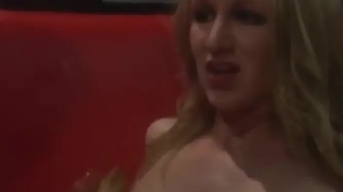 Kinky latex-clad dyke dominates her lesbo sub with toys and tape