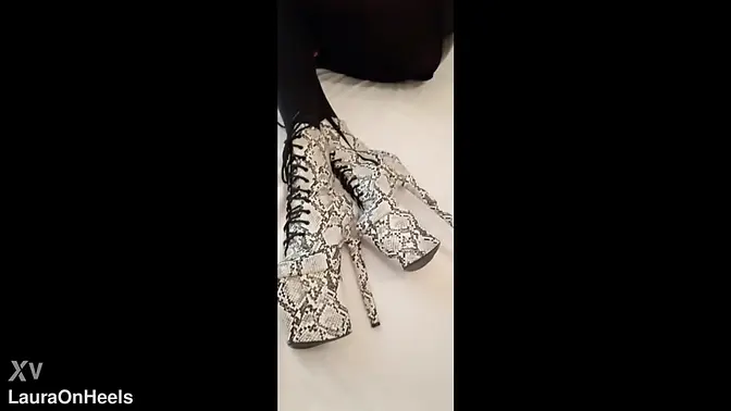 Latina MILF in latex outfit, stockings, and high heels