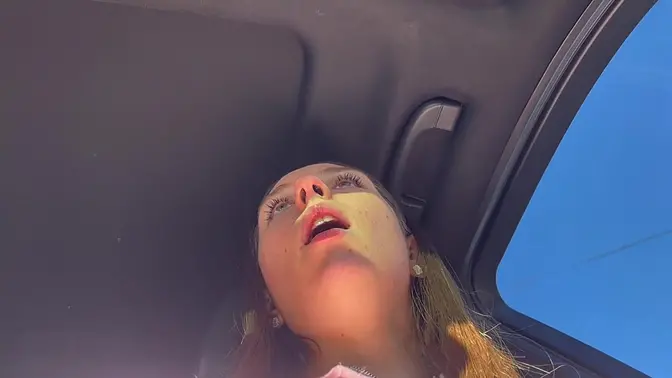Leather-clad girl gasps and shivers while her nose is tickled endlessly in a car ride POV