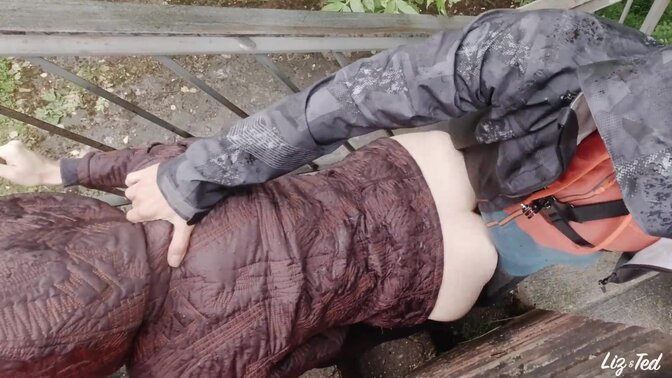 Liz and Ted enjoy a lusty outdoor tryst beneath the rain on a romantic