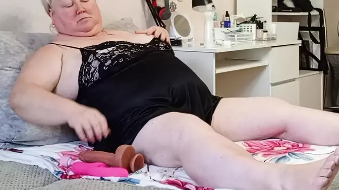 Loneliness of milf brightened up by big sex toys in pussy