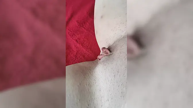 Lonely girl fingers herself with a dildo