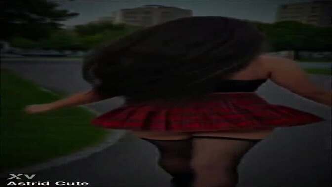 Long-haired Latina teen with big booty shakes her sultry skirts