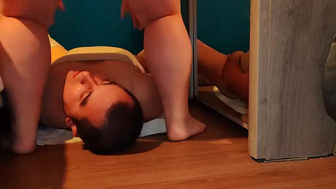 Lusty girl in lingerie teasing with her ass