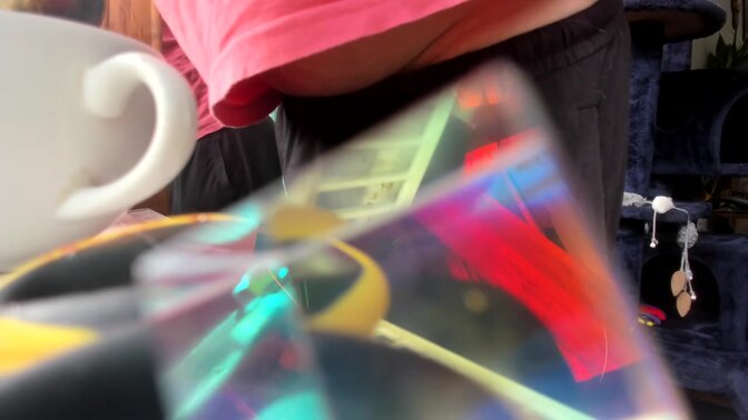 Male webcam performer moans while performing for his audience on a sunny day 