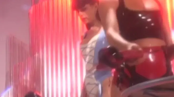 Masked latex babe gets toyed with by lesbian femdom