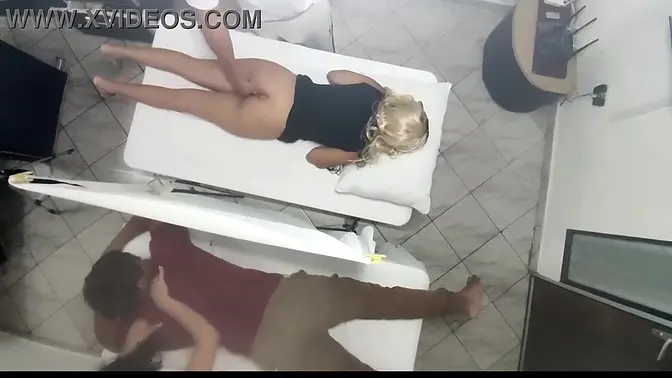 Massage masseur seduces wife next to her husband