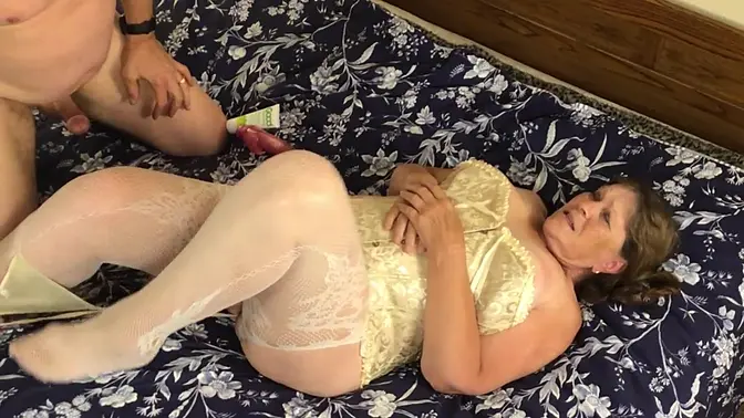 Mature granny Carmen Angel gets her tight pussy filled with a dildo