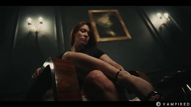 Mesmerizing lesbian vampire with huge tits dominates Sata Jones