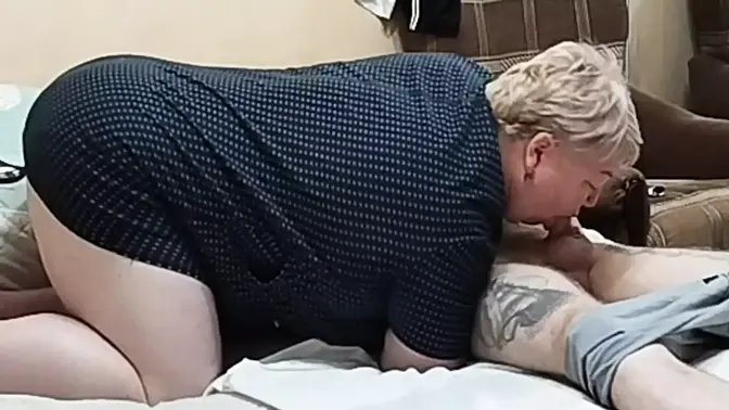 MILF gives deepthroat blowjob while wife watches closely