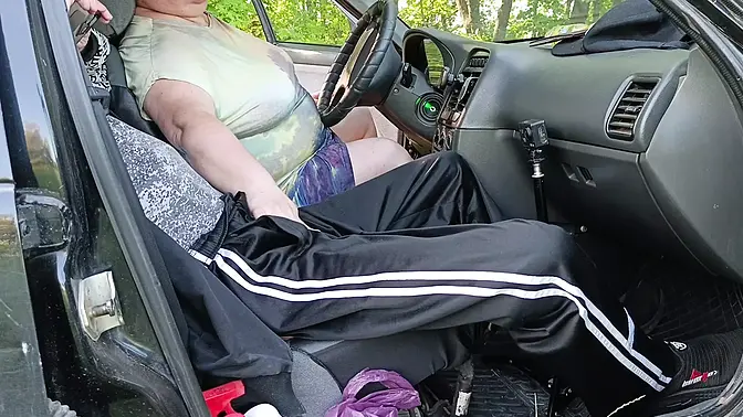 MILF jacks off stepson's cock in the parking lot