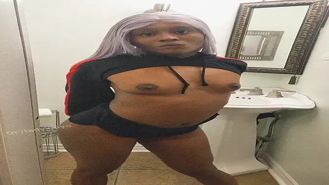 Naughty ebony babe teases in booty shorts