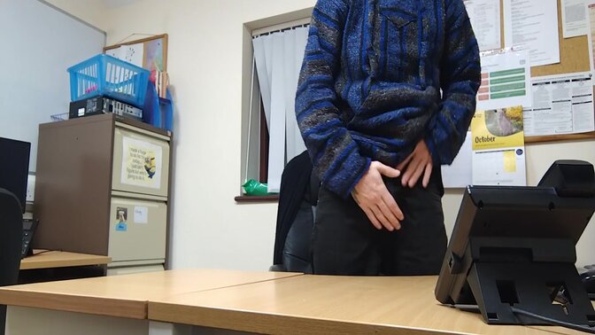 Naughty male coworker gets caught masturbating at his desk while the boss