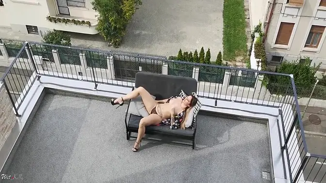 Neighbor's wife gets caught pleasuring herself on the terrace