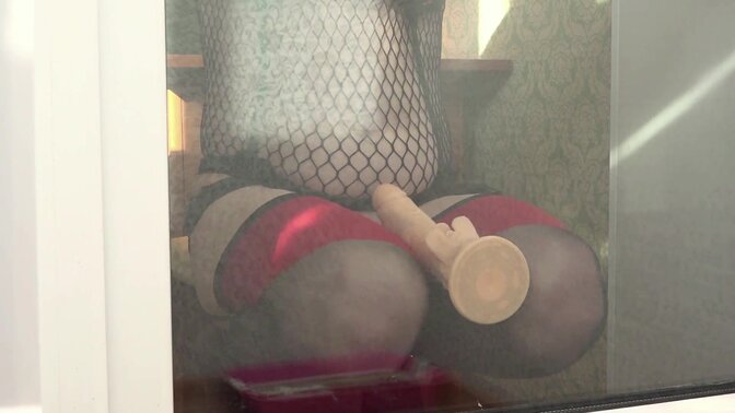 Neighbor watches MILF masturbate with a dildo in doggy style