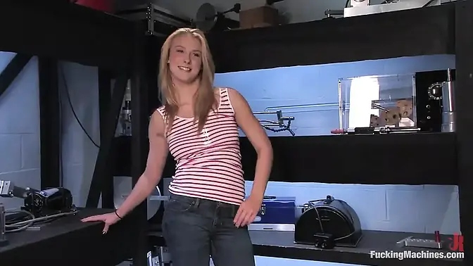 Nervous newcomer girl strokes long machine to ease her turn-on