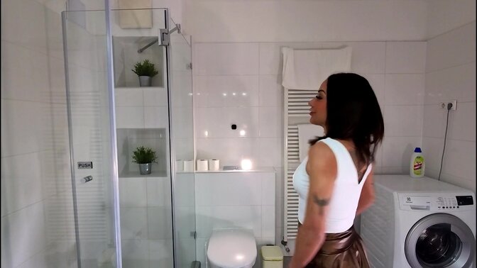 Petite brunette babe gets ignored in the bathroom