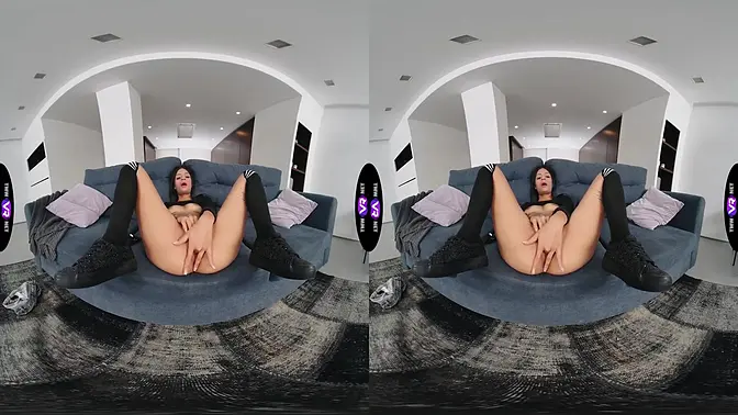 Petite inked teen self-pleasures in immersive scene