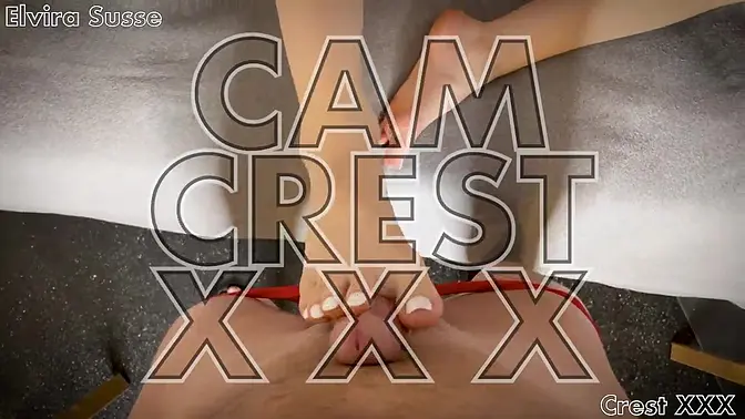 Petite redhead Elvira teases with feet and footjob