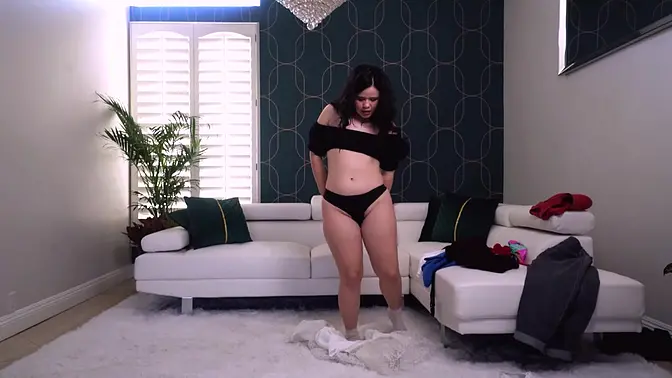 Petite solo girl tries on clothes and shows off her tight butt