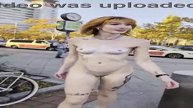 Pixie Pink gets caught in the act, walking fully nude in public