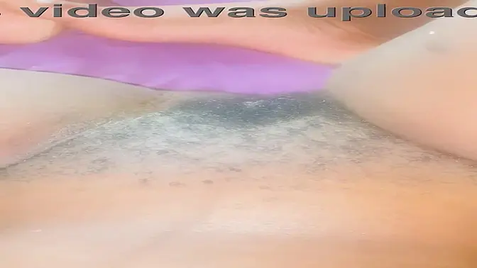 Pretty black girl shows off her bushy, creamy, pink pussy