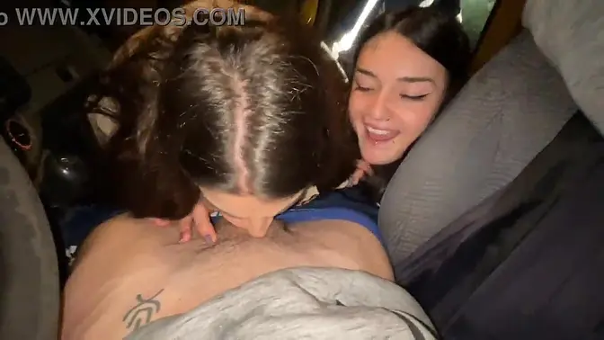 Pretty French girl gives double blowjob in a van