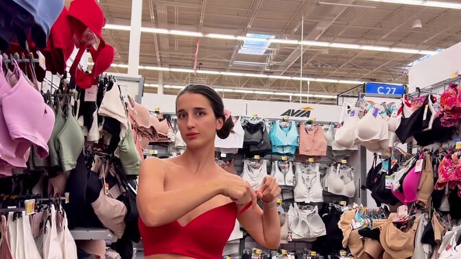 Public tease shows off tits and ass in the store
