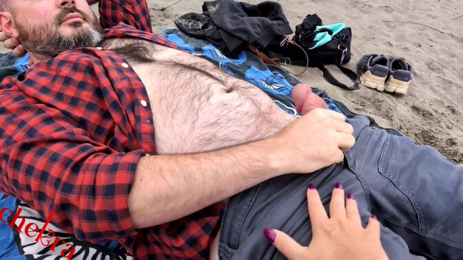 Redhaired Chekra gives a deepthroat blowjob to a lucky stranger at the beach