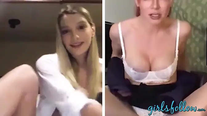 Redhead dyke fingers her big natural tits while watching herself on webcam