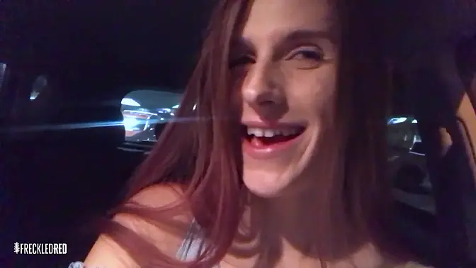 Redhead tomboy flashes her long hair and burps loudly in public parking lot