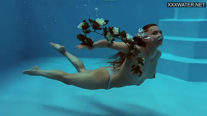 Russian gymnast Mia Split swims naked with tight pussy on display