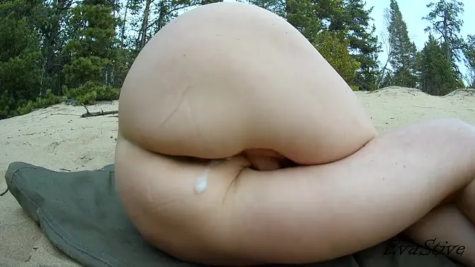 Russian MILF masturbates her ass outside after being fucked