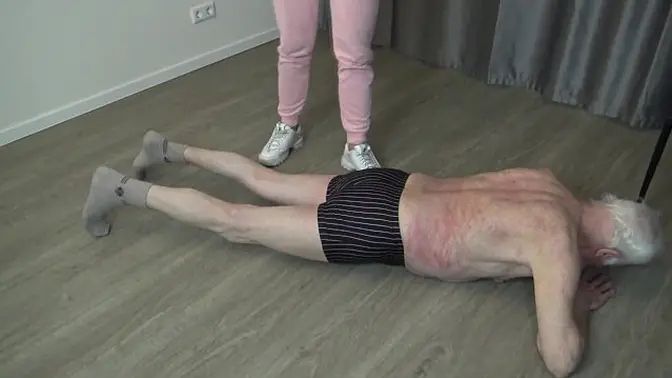 Sadistic Nurse Dominates Slave with Kicks and Torment