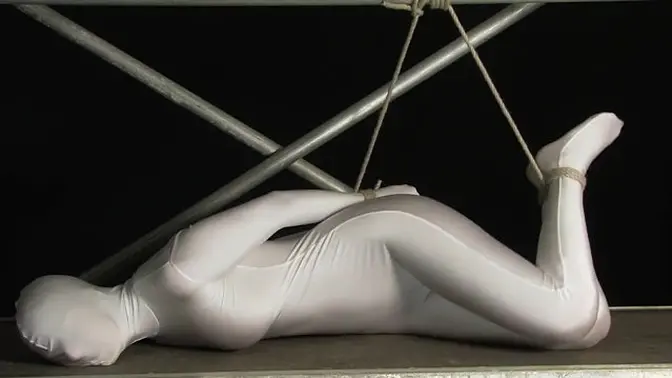 Sensual bondage slave wrapped in white zentai