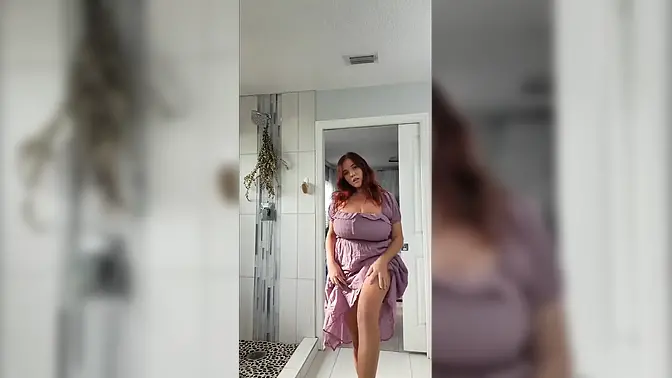 Sensual woman tries on sexy lingerie, flaunting big natural tits