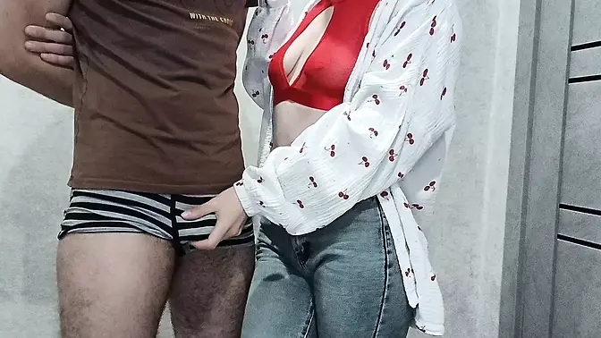 Sexy MILF gives handjob to her boyfriend's hard cock