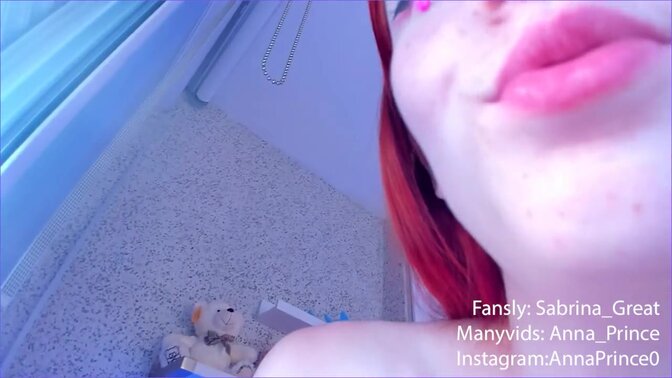 Sexy redhead seduces guy into smoking and stripping