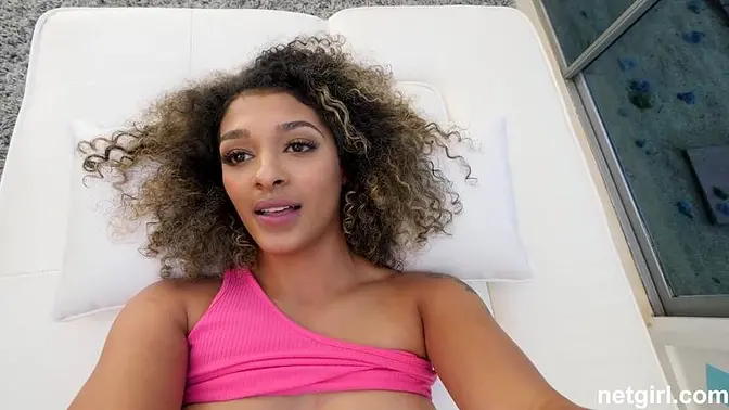 Shiny ebony hoe flashes her shaved pussy for a tattooed man