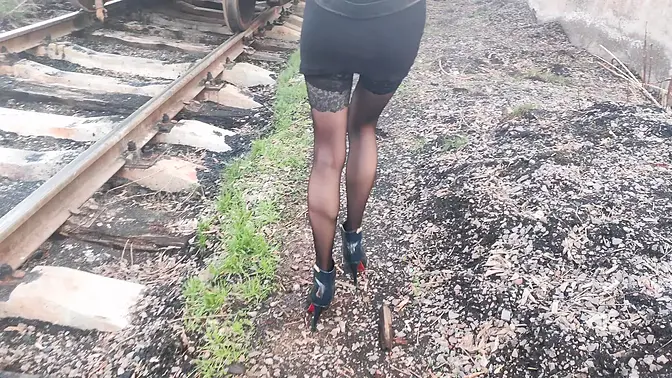 Skinny girl in stockings and high heels gets fucked doggy style on the street