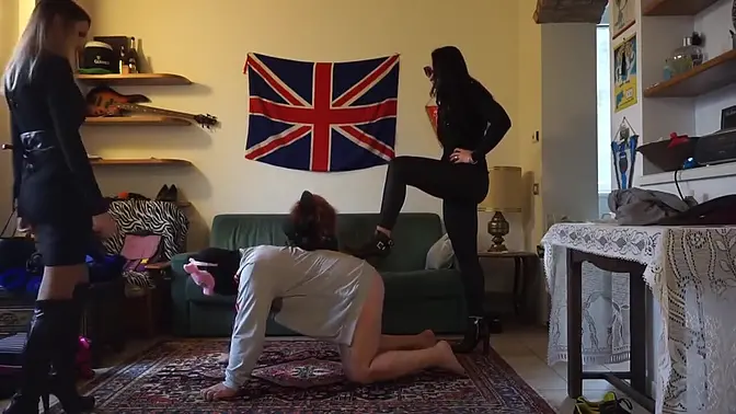 Slave girl in high heels takes ballbusting and domination from her mistress