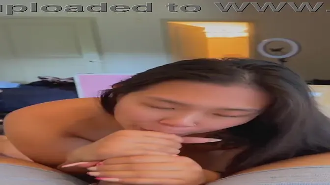 Sluttish Asian beauty deepthroats massive cock