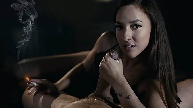 Smoking fetish: Mistress Amirah adara gives handjobs to a big hard cock while smoking on it