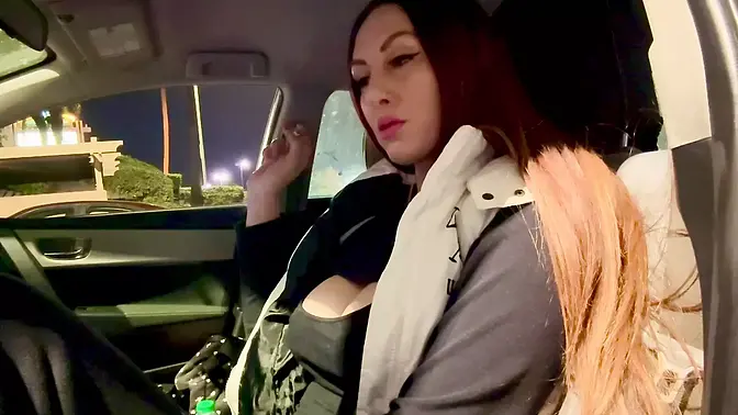 Smoking MILF Artemisia Love shows off her huge tits in a car